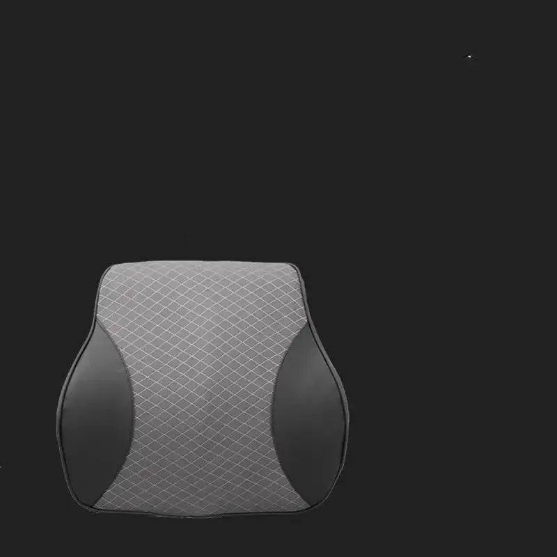 Gray and black ergonomic lumbar support pillow with a diamond-patterned fabric design.
