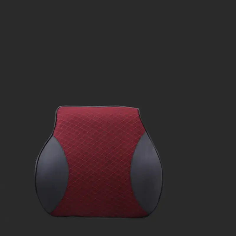 Red and gray quilted lumbar support pillow with a contoured design.