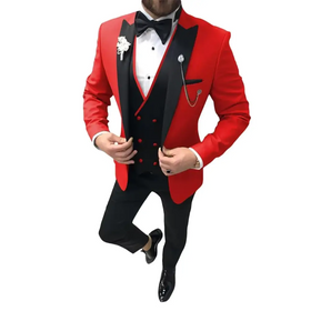 A striking red and black tuxedo jacket with satin lapels, matching vest, and a white dress shirt.