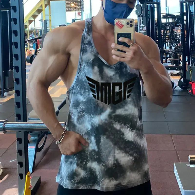 Gray and white tie-dye muscle tank top with black ’amge’ logo