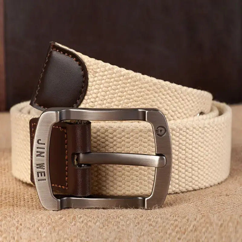Beige woven canvas belt with a dark brown leather accent and silver-toned metal buckle engraved with ’jin wei’.