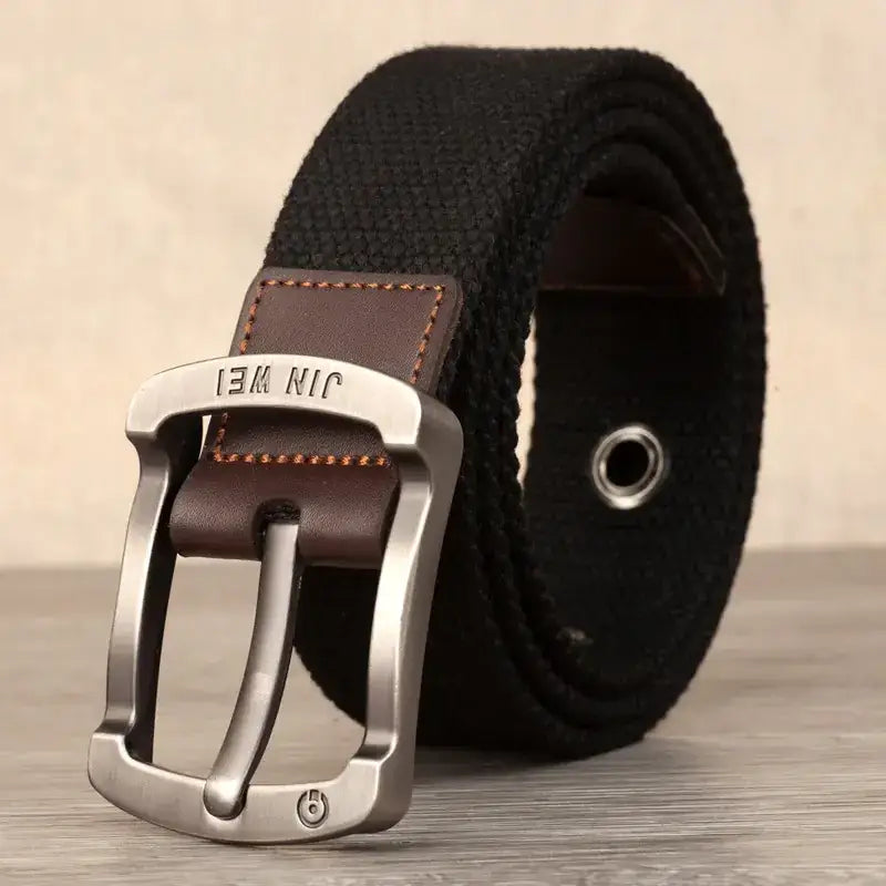 Black canvas belt with a silver-toned buckle and brown leather accent stitching.