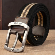 Black and beige striped canvas belt with a silver-toned metal buckle featuring the brand name ’jin wei’ engraved on it.