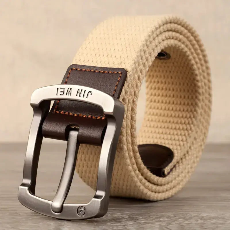 Beige woven canvas belt with a silver-toned metal buckle and dark brown leather accents.