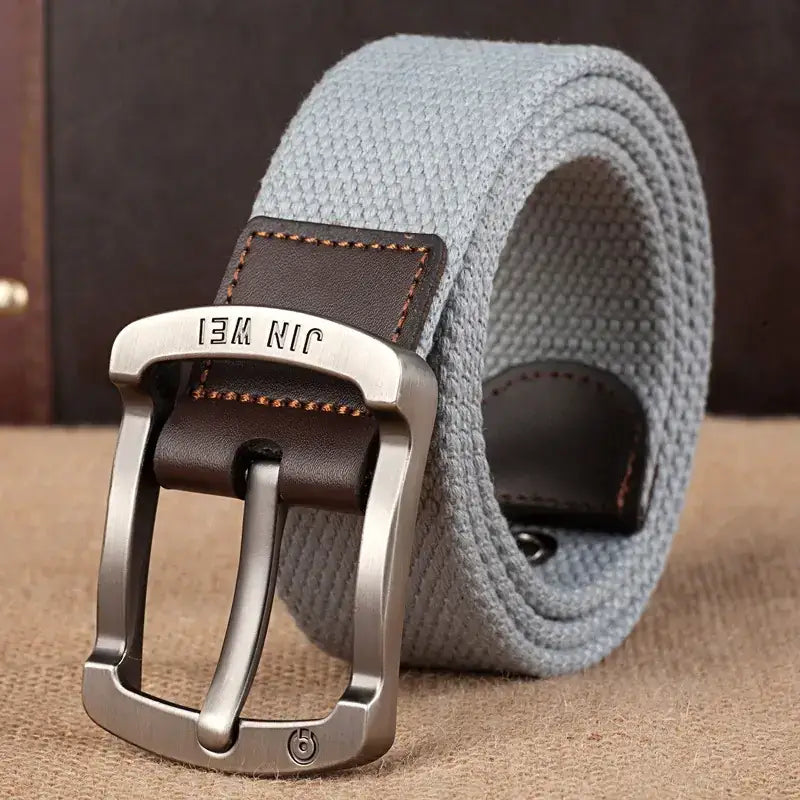 Gray woven canvas belt with a silver-toned metal buckle and brown leather accent.