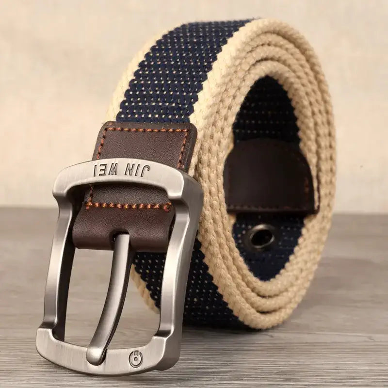 Navy blue and beige woven canvas belt with a silver-toned metal buckle featuring the brand name ’jin wei’ engraved on it.
