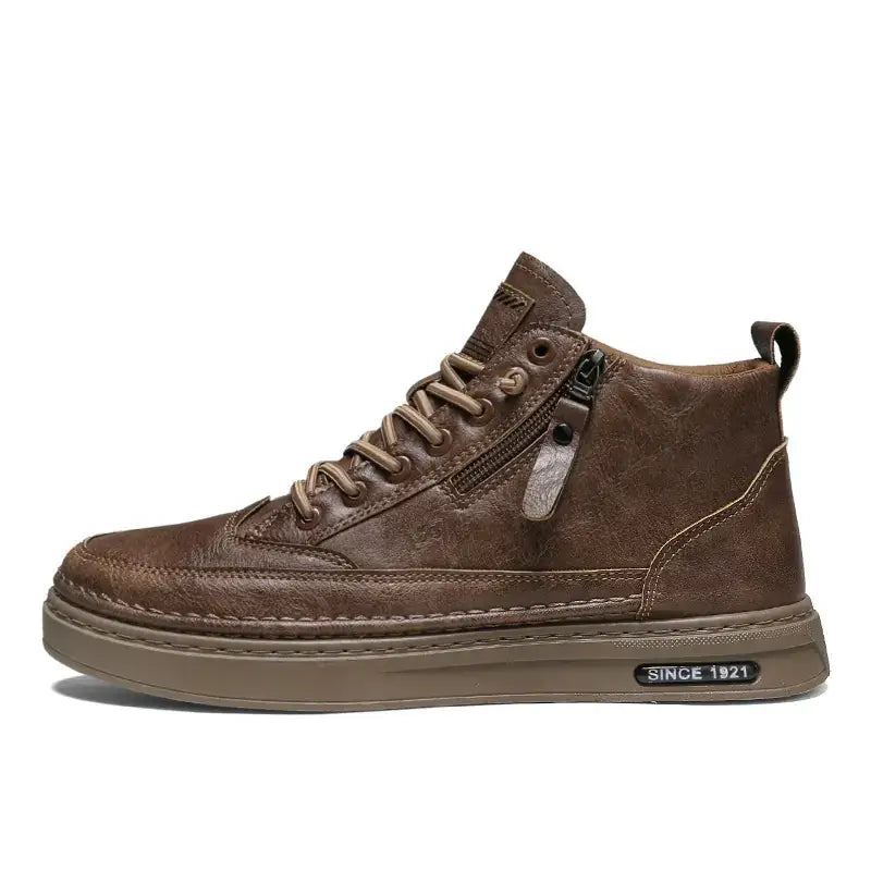 Brown leather high-top sneaker with a textured finish, laces matching the upper, and a zipper on the side for easy wear.