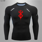 Black long-sleeved compression shirt with a red, dripping logo on the chest and white diagonal stripes on each shoulder.