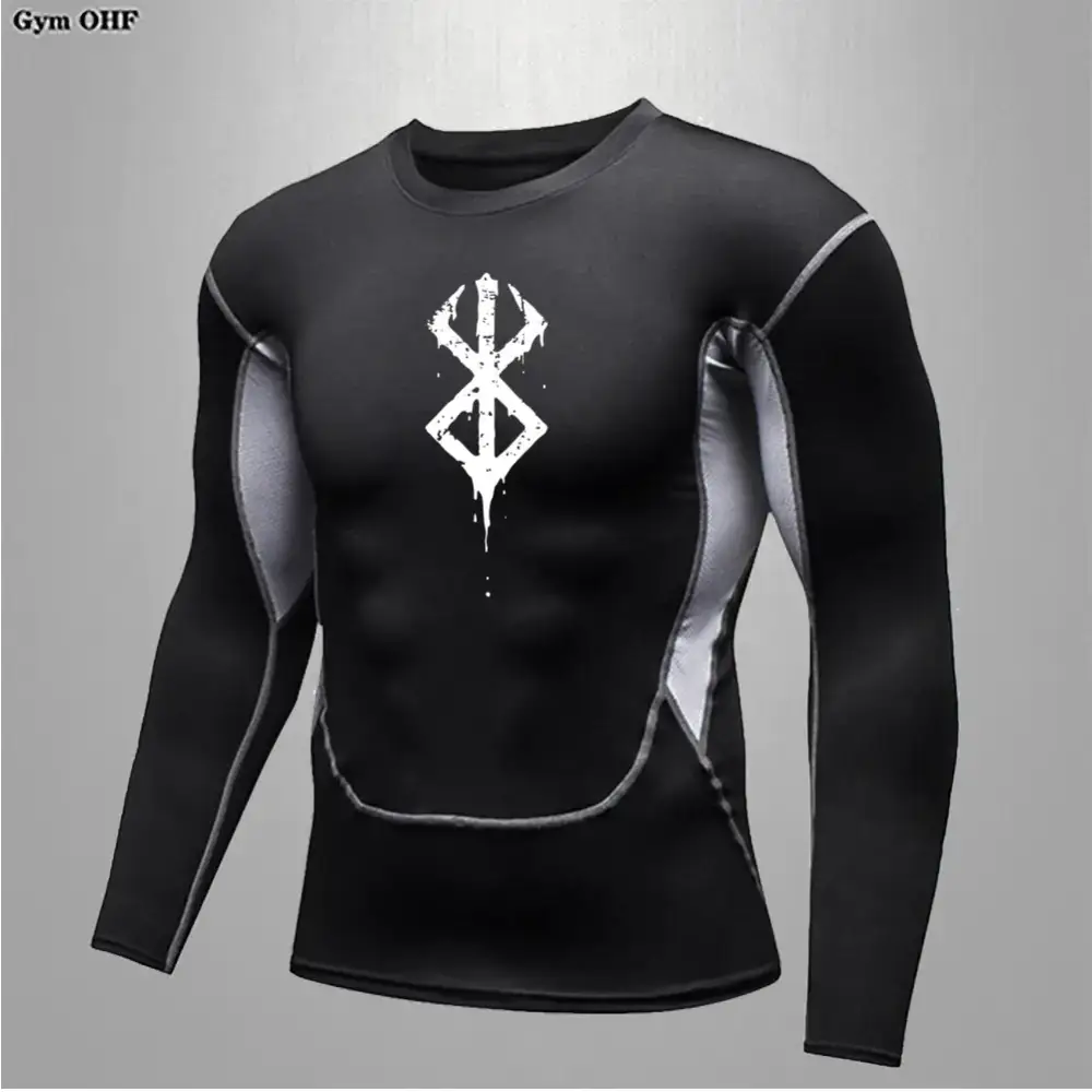 Black long-sleeved compression shirt with gray panels and a white distressed emblem on the chest.