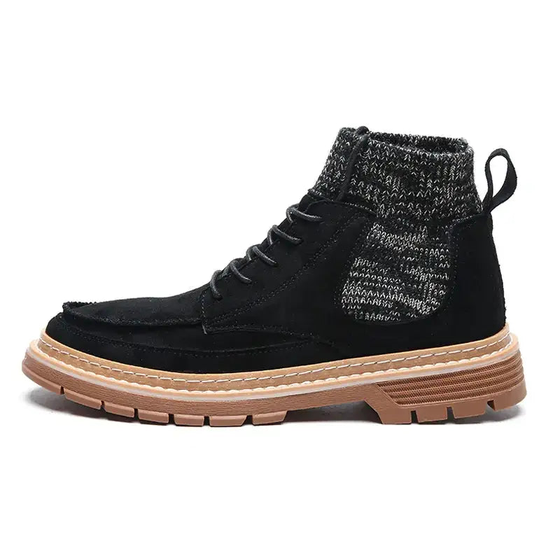 Black suede ankle boot with a textured knit collar and side panel, featuring a tan rubber sole.