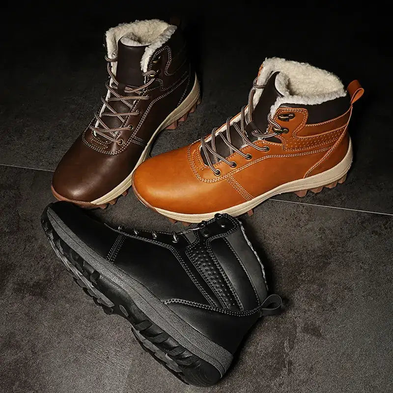 Brown and black leather winter boots with plush white lining.