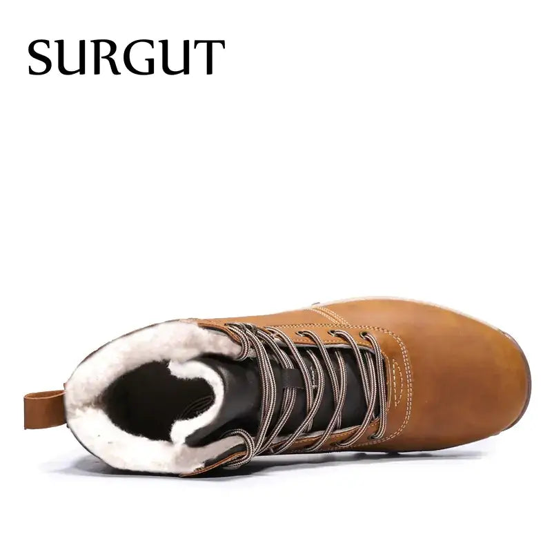 Tan leather surgut winter boot with white shearling lining and dark laces.