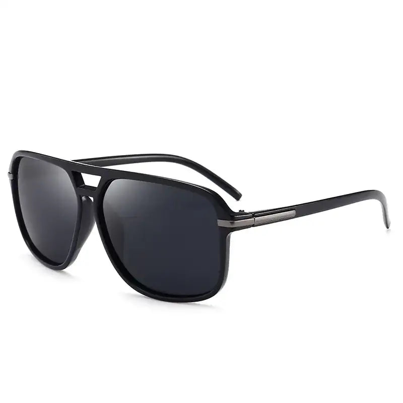 Black aviator sunglasses with dark gray lenses and a sleek, modern frame design.