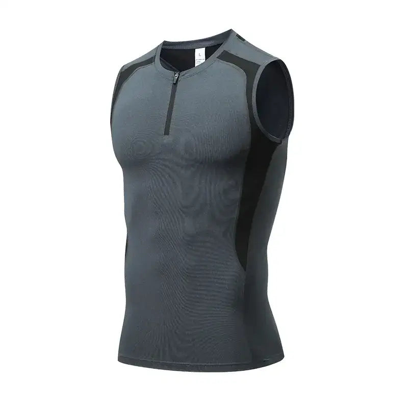 A sleek, form-fitting sleeveless athletic top in dark gray with black panels and a subtle textured pattern.