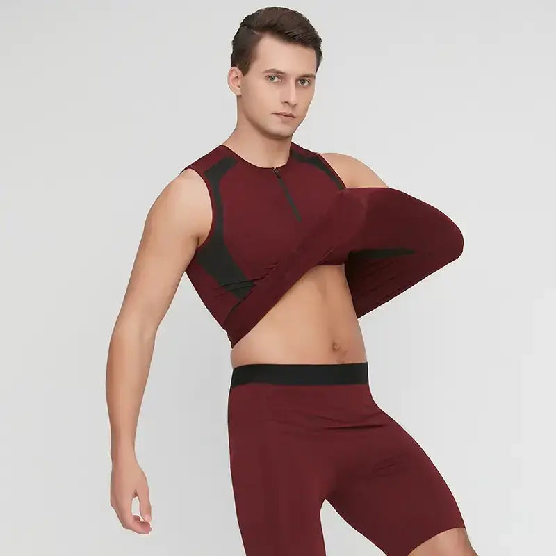 Maroon and black athletic top with a zippered neckline.
