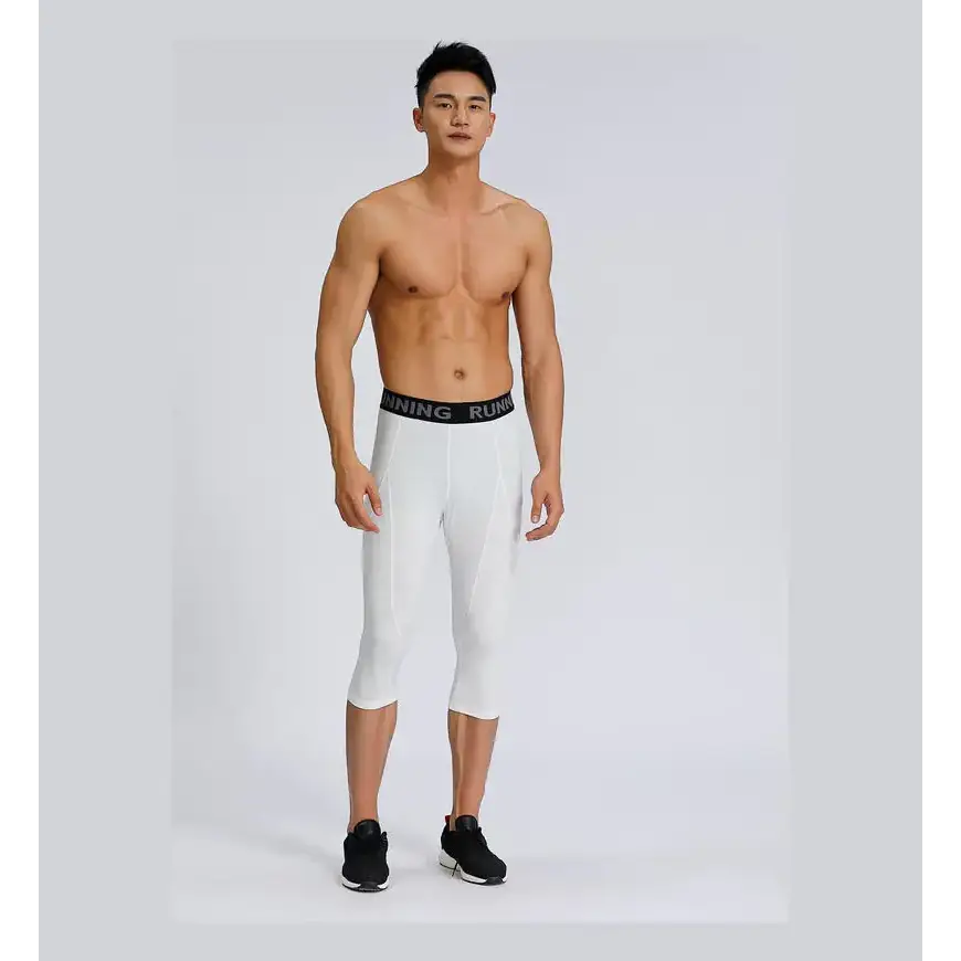 White capri-length running tights with a black waistband featuring the word ’running’ in white lettering.