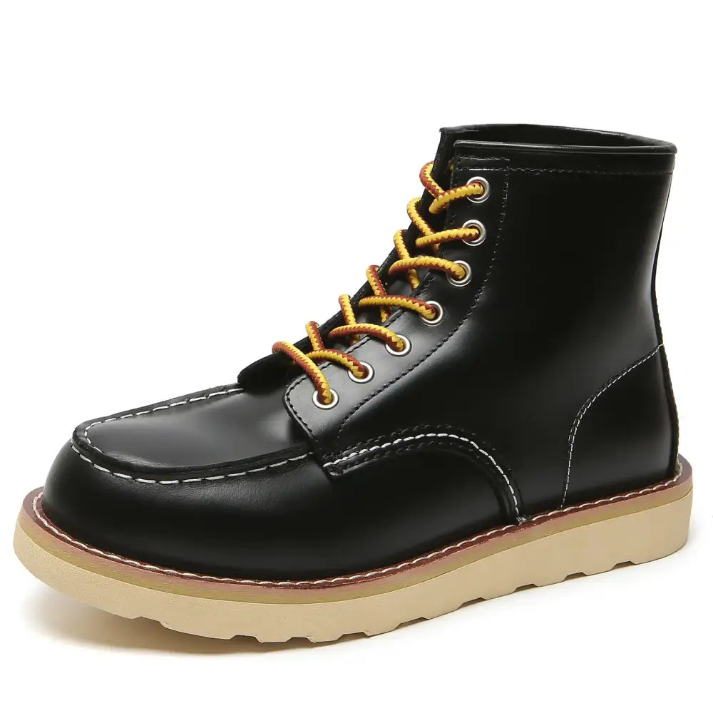 Black leather ankle boot with yellow laces and a tan rubber sole.