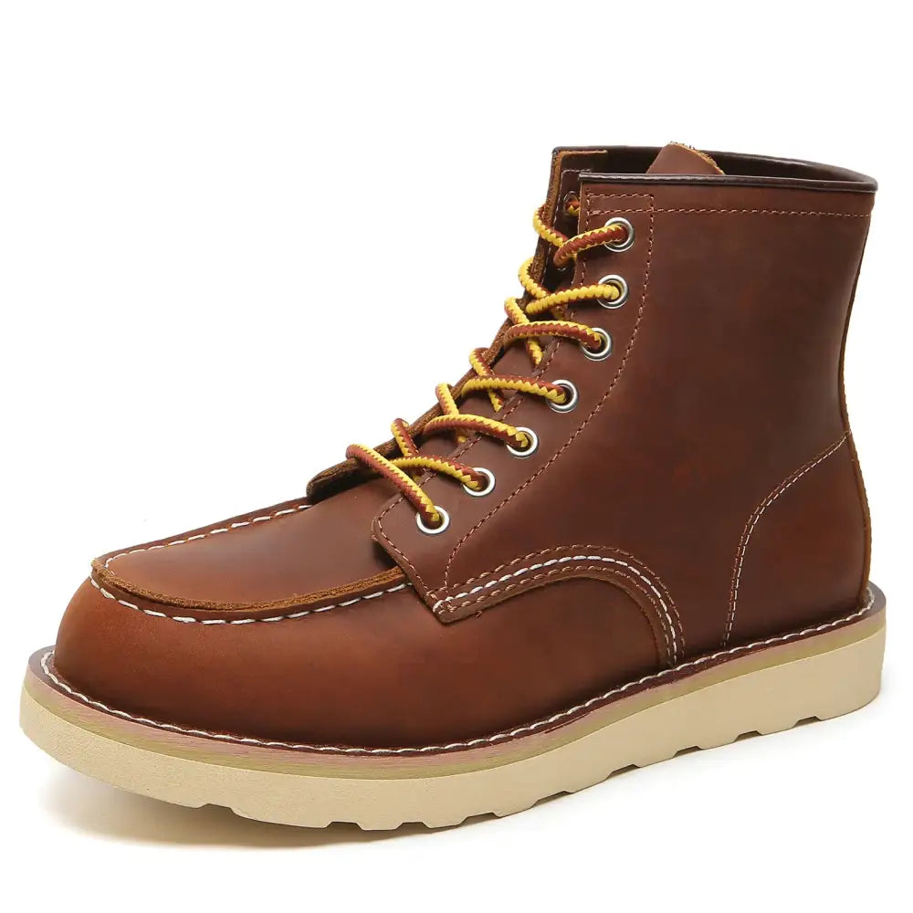 Brown leather work boot with yellow laces and white stitching.