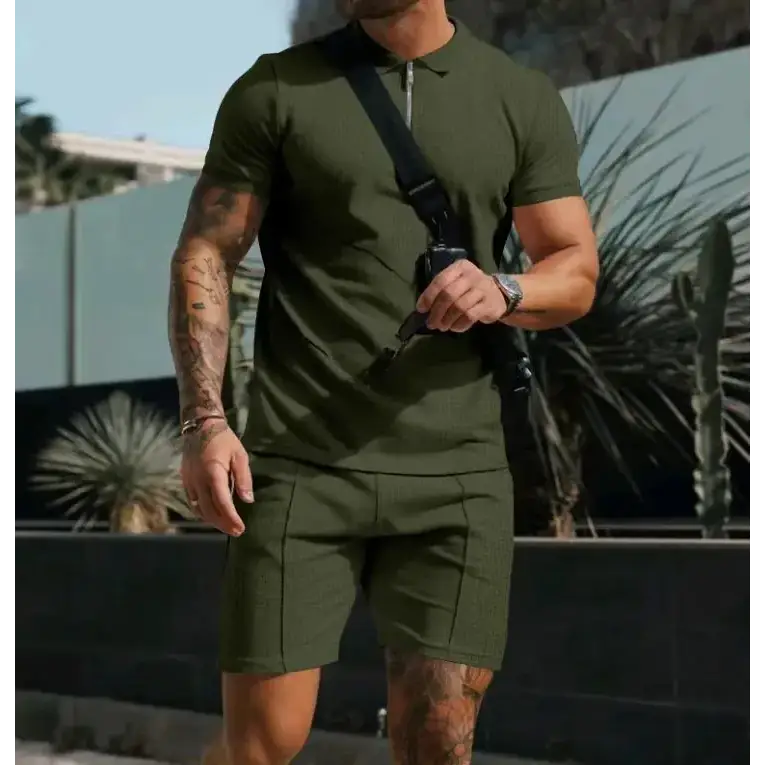 Olive green textured polo shirt with short sleeves and a zipper neckline
