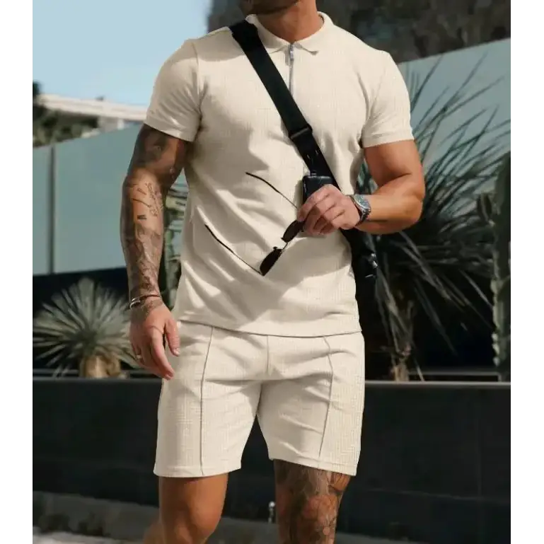 Beige textured polo shirt with a subtle zip-up collar and matching shorts.