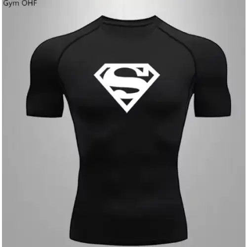 Black short-sleeved compression shirt featuring a prominent white superman logo on the chest.