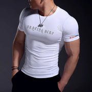 White athletic t-shirt with ’braving hero’ printed in silver lettering across the chest and a red logo on the sleeve.