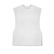 White textured sleeveless top with a round neckline.