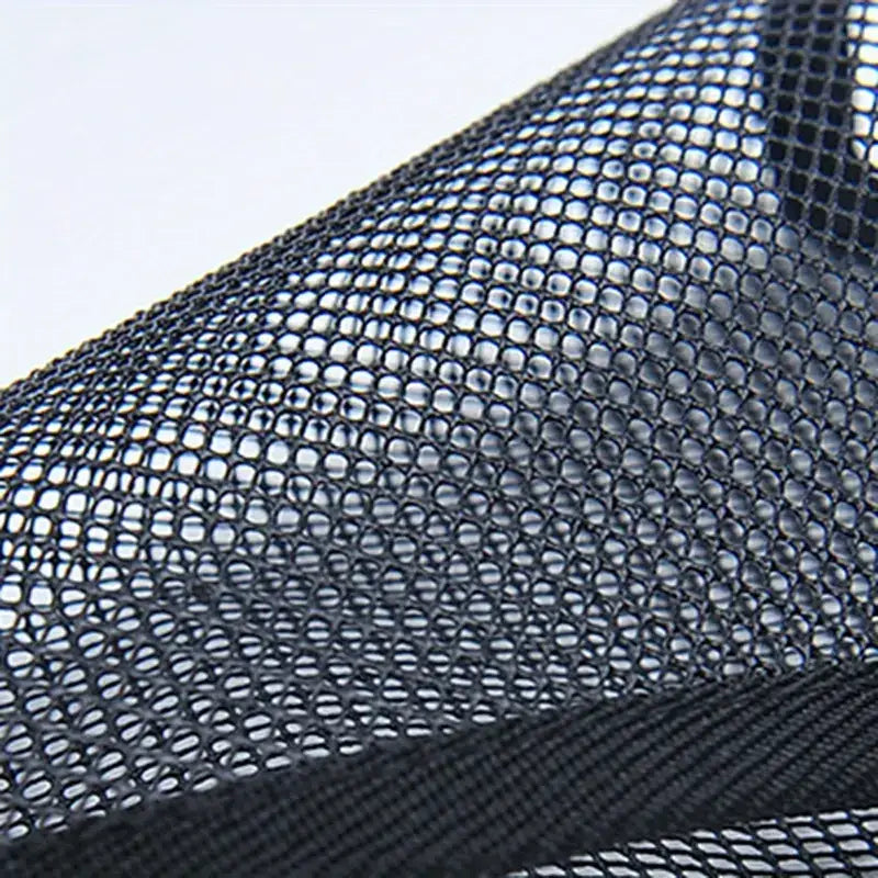 Black mesh fabric with a fine, uniform grid pattern.