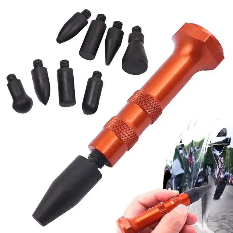 Orange aluminum-bodied dent puller with black rubber-tipped attachments.