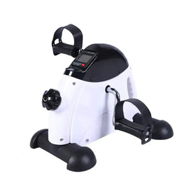 Black and white compact exercise bike with digital display.