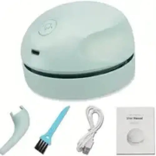 Light blue compact desktop vacuum cleaner with a sleek, rounded design and included cleaning tools.