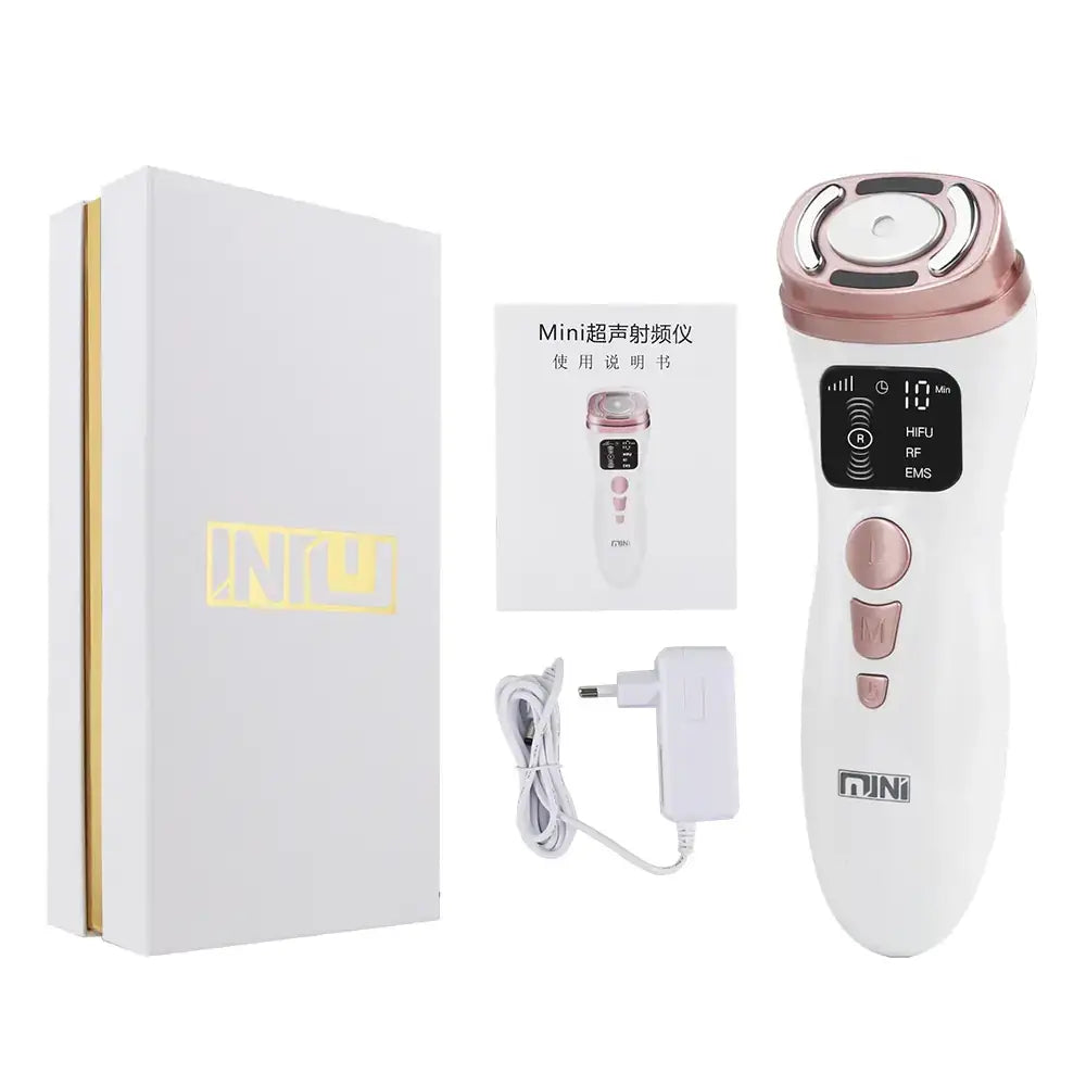 White and rose gold handheld facial device with a digital display showing treatment modes.