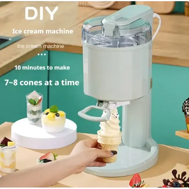 Light blue electric ice cream machine with a clear lid and white base, dispensing soft-serve into a waffle cone.