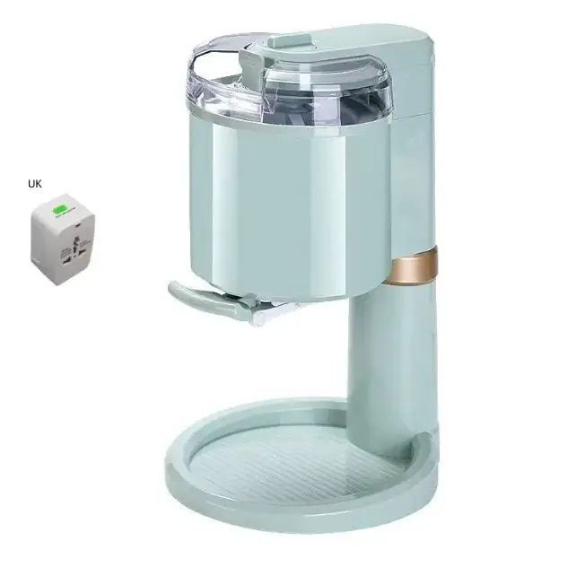 Mint green countertop ice cream maker with clear lid and gold accent band.