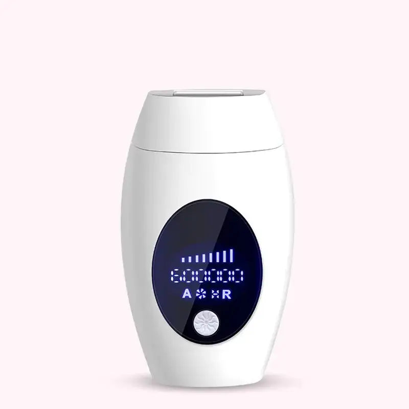 White handheld laser hair removal device with a sleek oval design and an illuminated digital display showing settings.