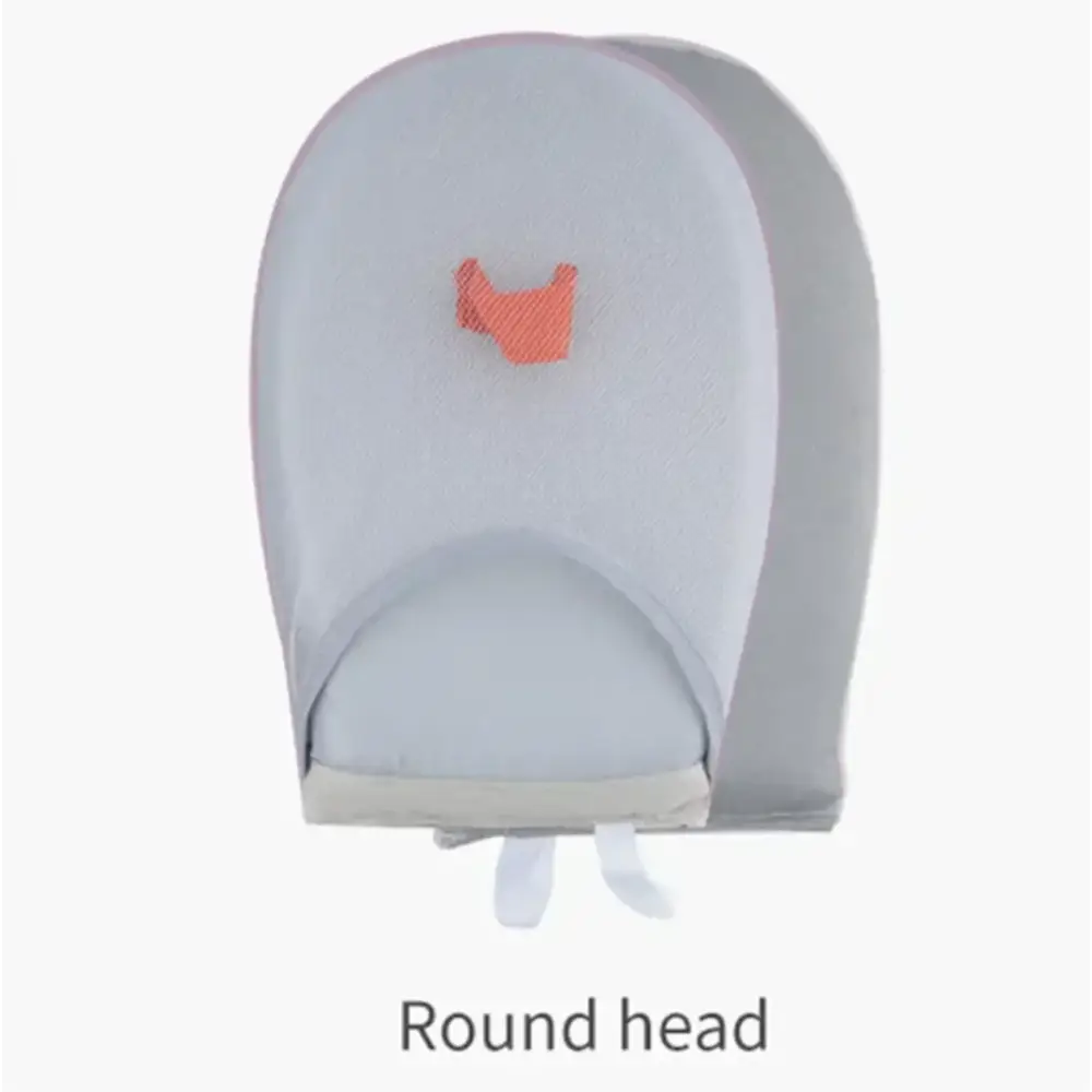 Gray round-head tissue dispenser with a small orange fabric detail on the front.