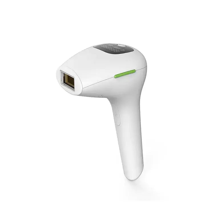 White handheld laser hair removal device with a green accent stripe and black control panel.