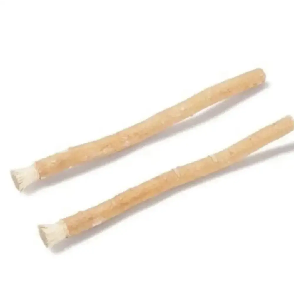 Two natural, light beige neem twigs with slightly rough textures and tapered ends.