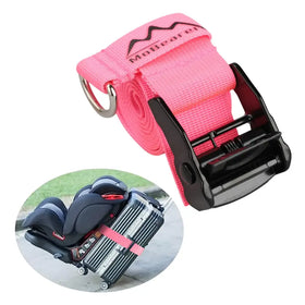 Pink mobearing brand strap with black plastic buckle and metal ring, designed for securing luggage to car seats.