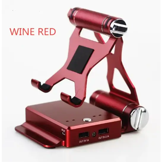 Wine red aluminum tablet stand with integrated portable charger and usb ports.