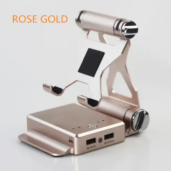 Rose gold smartphone stand with integrated charging ports and a sleek, modern design.