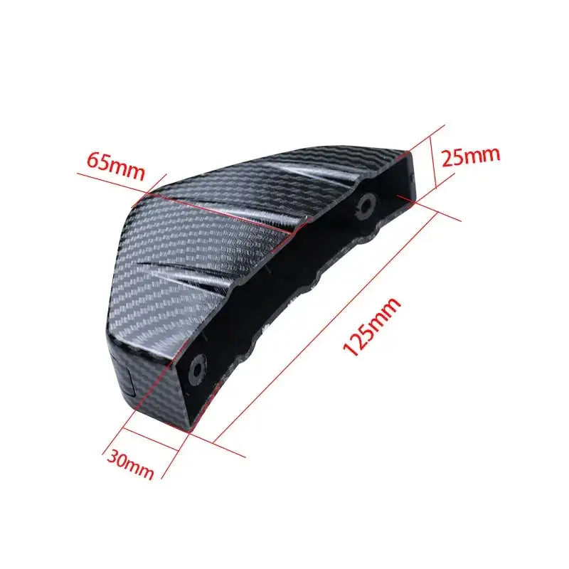 Black carbon fiber car door handle cover with a sleek, textured surface and precise cutouts for mounting.