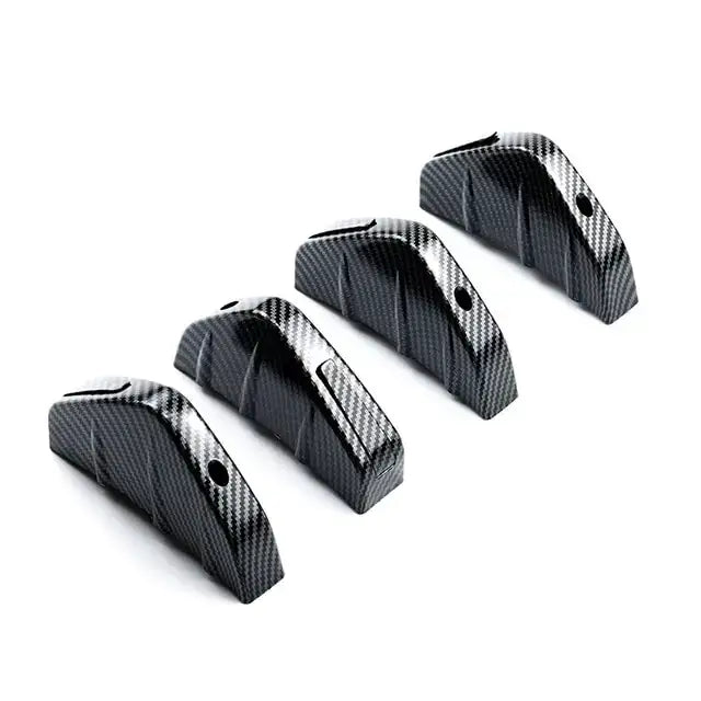 Black carbon fiber car door handle covers with a sleek, textured weave pattern and precise cutouts for functionality.