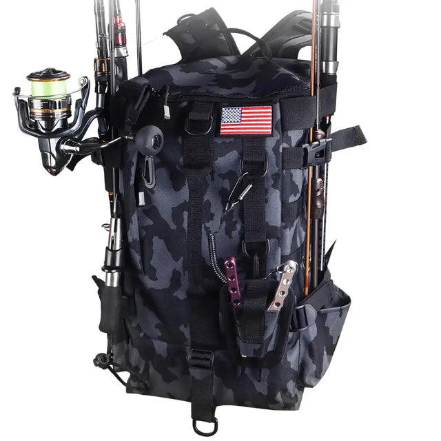 Black and gray camouflage fishing backpack with american flag patch, multiple straps for gear organization.