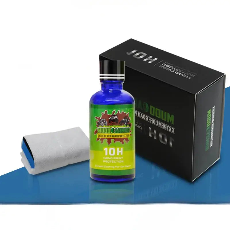 Blue glass bottle of mud-o-armor 10h nano mint protection car coating with green and yellow label.