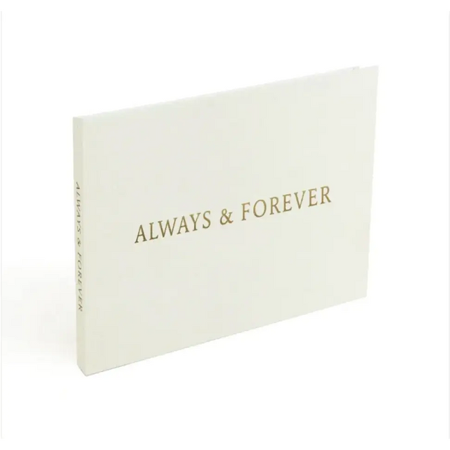 A cream-colored keepsake album with ’always & forever’ embossed in gold lettering on the cover.