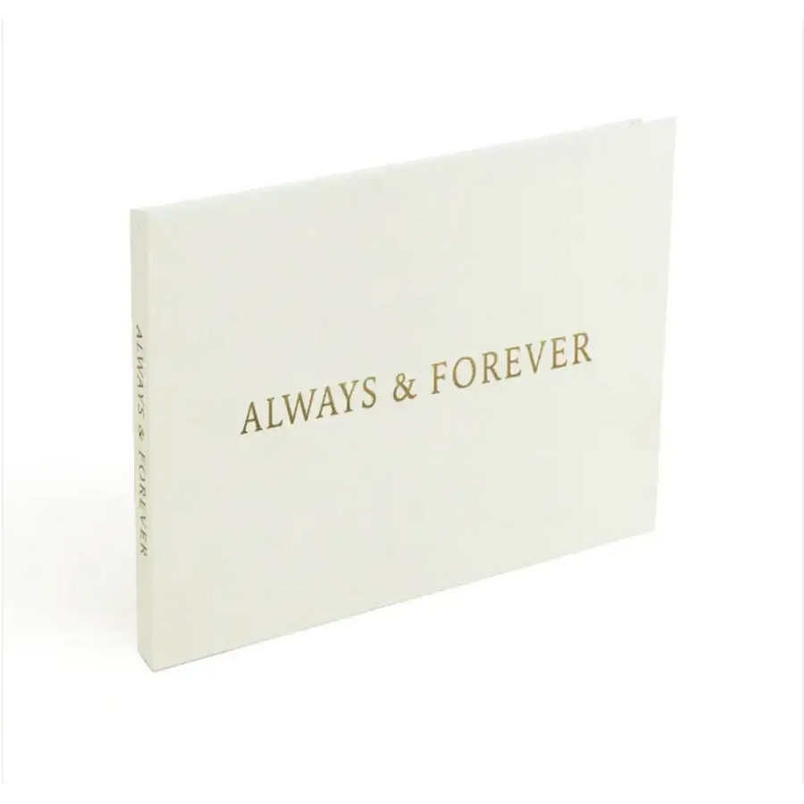A cream-colored keepsake album with ’always & forever’ embossed in gold lettering on the cover.