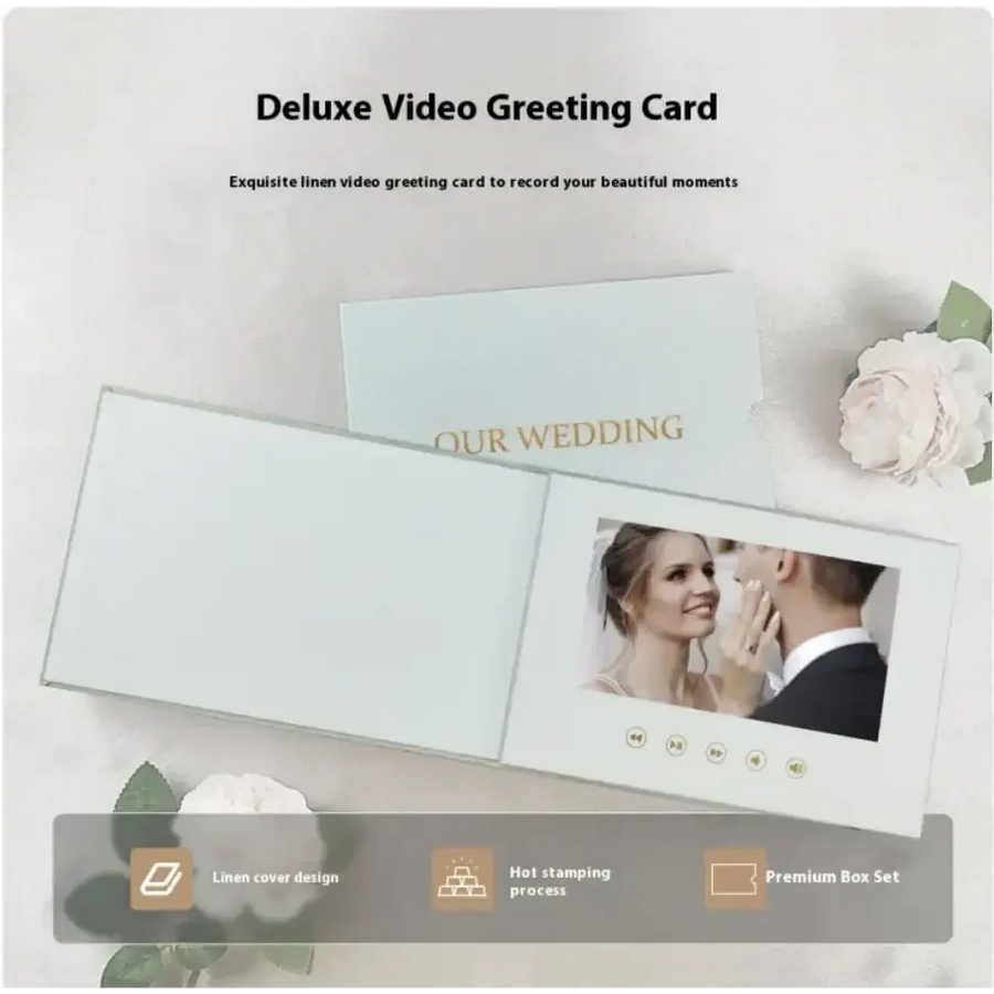 Deluxe video greeting card with a linen cover design, featuring an embedded screen displaying a wedding moment and gold-embossed ’our wedding’ text.