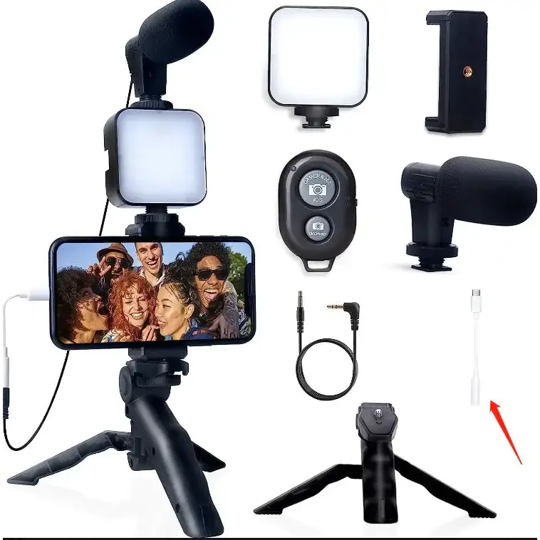 Black smartphone tripod with adjustable legs and a mounted phone displaying a group photo
