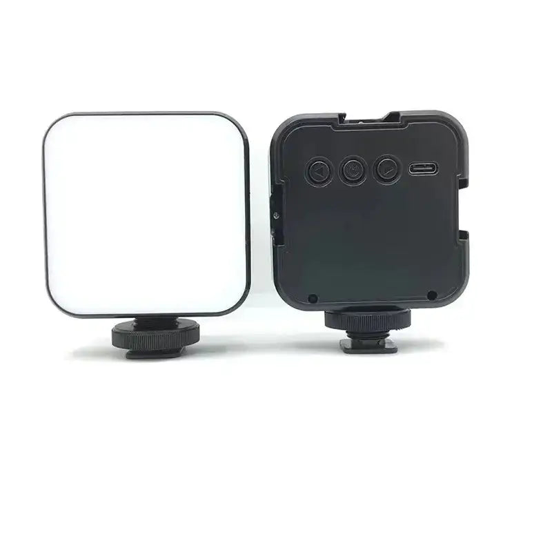 Black square led light with a matte finish and three control buttons on the back, featuring a usb-c port for charging.